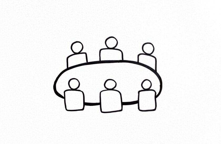 Skizzierter Tisch mit 6 Menschen drumherum, als Symbol für ein Team-Meeting